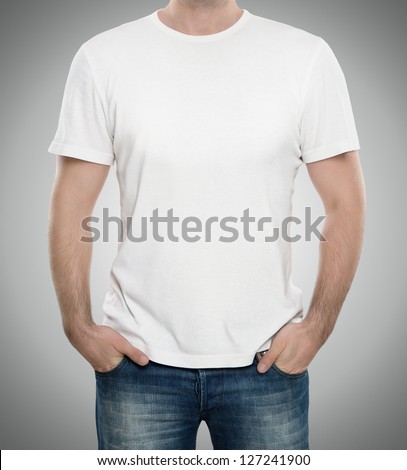 Man wearing blank t-shirt isolated on gray background with copy space Royalty-Free Stock Photo #127241900