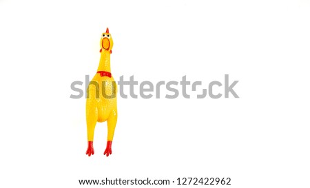 Shrilling Chicken squeaky toy . toy rubber shriek yellow chicken isolated on white background Royalty-Free Stock Photo #1272422962