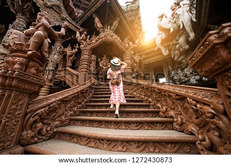 Tourist is traveling inside Sanctuary of truth in Pattaya, Thailand. Royalty-Free Stock Photo #1272430873