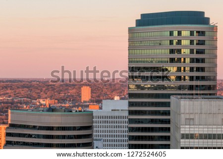 A Close Up Cityscape Shot of Orange Sunset Light on the Fifth Street Towers in Downtown Minneapolis