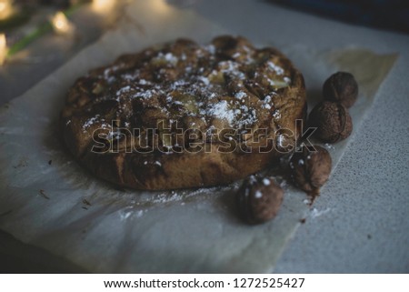 cake on the table, nuts. beautiful background on food theme Royalty-Free Stock Photo #1272525427