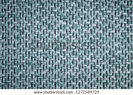Textured background surface of textile upholstery furniture close-up. gray blue Color fabric structure
