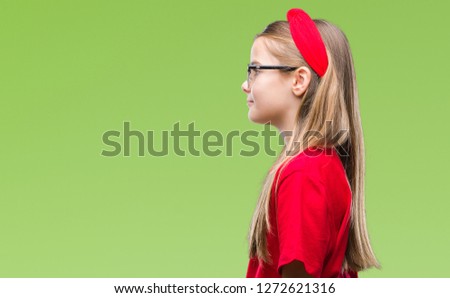 Young beautiful girl wearing glasses over isolated background looking to side, relax profile pose with natural face with confident smile.