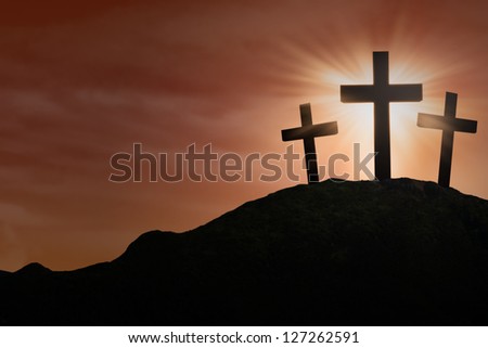 silhouette of three Crosses sign on top of a hill