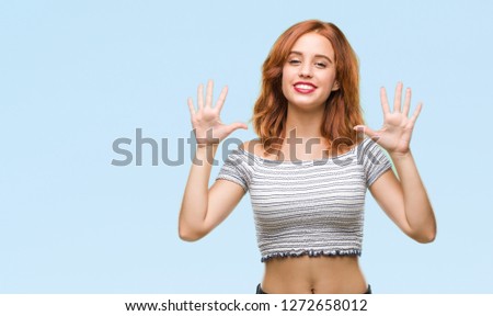 Young beautiful woman over isolated background showing and pointing up with fingers number ten while smiling confident and happy.