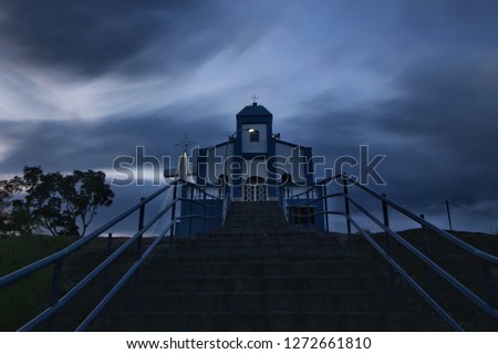Chapel under dramatic sky