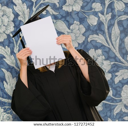 Graduate Woman Holding Placard On Wallpaper