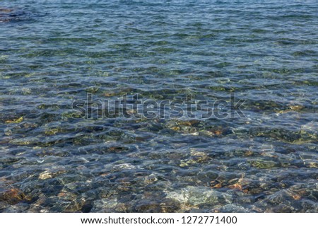 Sea water background, crystalline and transparent