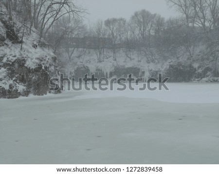 Frozen lake during a snow storm in Chicago Illinois 