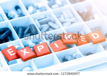 Oral medicine with expiration concept. Royalty-Free Stock Photo #1272840097