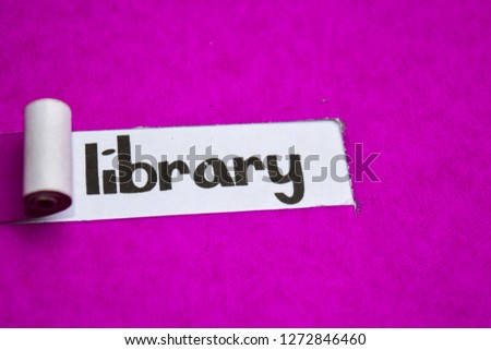 Library text, Inspiration, Motivation and business concept on purple torn paper