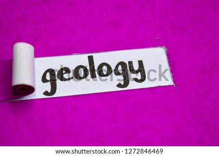 Geology text, Inspiration, Motivation and business concept on purple torn paper