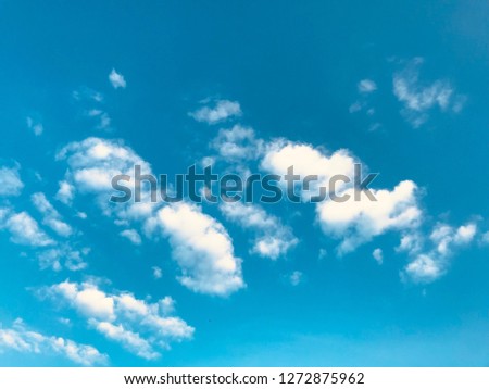 The white cloud on light sky background