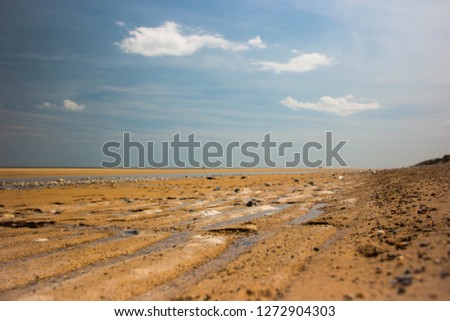 A picture of the beach at Winterton on Sea, Norfolk in the summer time. 