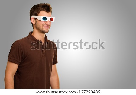 Happy Young Man Wearing 3d Glasses Isolated On Grey Background