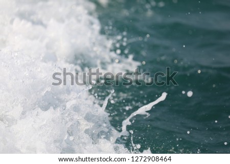 Tsunami waves,Double bokeh Beautiful sponge and sea wave:Use for website banner background,backdrop