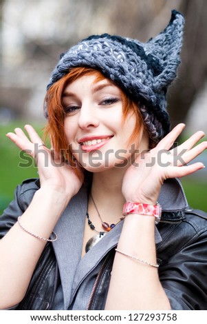 Young woman in a knitted hat