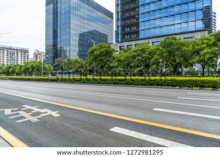 empty urban road with modern building in the city
