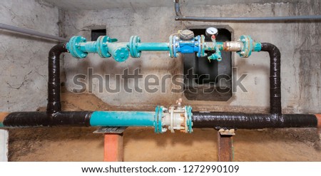 Basement apartment house. Water supply pipe. Composite repair performed. Picture taken in Ukraine. Kiev region. Horizontal frame. Color image