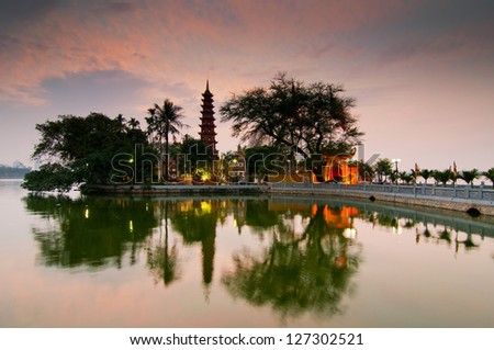 Tran Quoc pagoda in sunset Royalty-Free Stock Photo #127302521