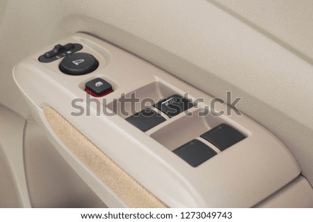 close up of automobile car power windows button