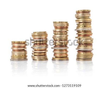 Euro Coin stacks on a white background Royalty-Free Stock Photo #1273119109