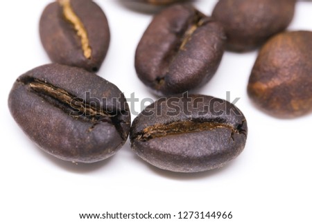 
Coffee beans background texture isolated on white background with copy space for text. Royalty high-quality free stock macro photo image roasted brown, black coffee bean isolated on white background