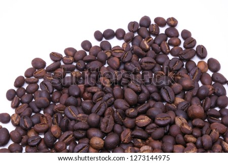 
Coffee beans background texture isolated on white background with copy space for text. Royalty high-quality free stock macro photo image roasted brown, black coffee bean isolated on white background