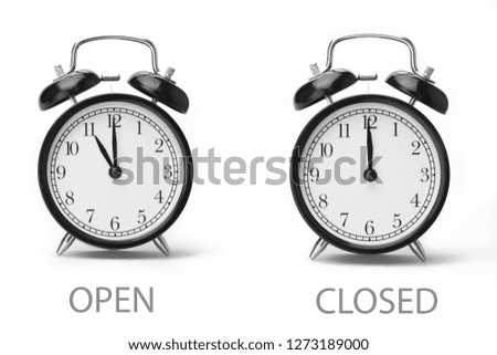 Sign showing business opening hours Black and white image Isolated on white background Close-up