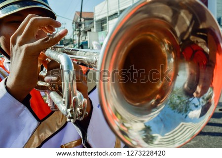 Musical instrument in marching band,Trumpet players in a military band.