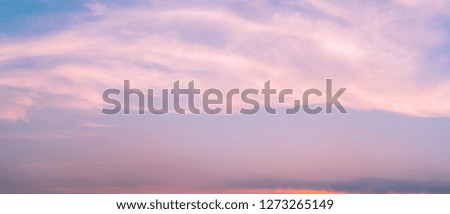 Dramatic pink sky and clouds abstract background. Art picture of pink clouds texture. Beautiful sunset sky. Sunset abstract background. Pastel color sky in the evening. Calm and relax life. Happy love