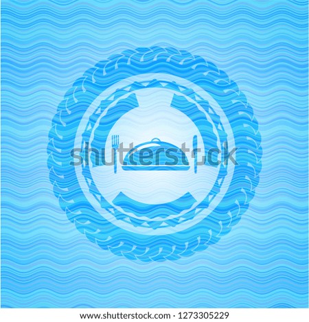 special food icon inside water wave concept badge.