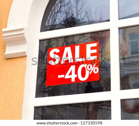 Discount sale sign in the window