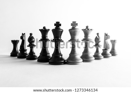 chess pieces in a line, black and white, game.