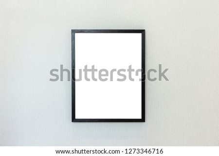 Blank black color picture frame template for place image or text inside on the wall