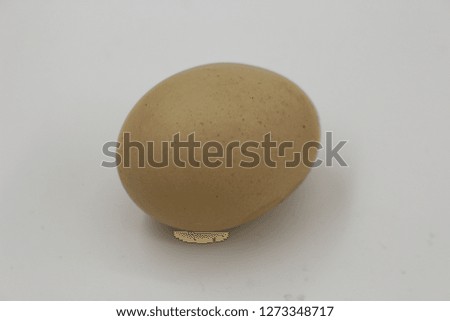 Brown boiled eggs on a white background