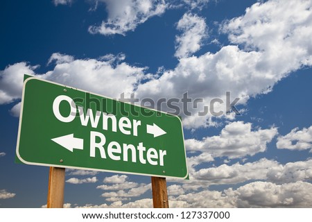 Owner, Renter Green Road Sign Over Dramatic Clouds and Sky.