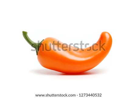 Orange chili pepper isolated on White 