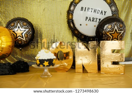 first cake, one year old child, birthday, 2 years old, beautiful photozone in sea style, black-gold background, colored background, green