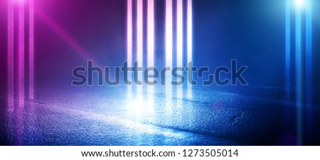 The background of wet asphalt, the reflection of the night lights of the city, neon light, smoke