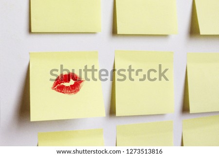 This is a picture with lipstick in the form of a lips letter for Valentine's day