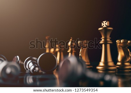 business strategy brainstorm chess board game with hand touch black background with free copy space for your text