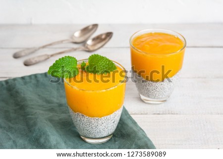 Chia seeds pudding with mango puree. Healthy breakfast. Sweet healthy dessert.