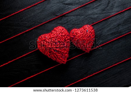 Valentines day greeting card. Handmaded hearts on wooden table. Love background.