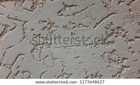 Decorative plaster. Rough plastered surface