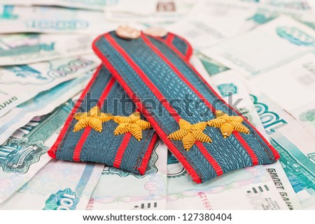 Shoulder strap of russian police on money background