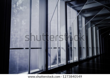 Glass corridor that linked between two buildings with no one. B&W color