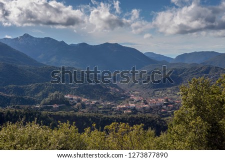 The village Dyrrachi in a mountainous countryside on a sunny winter day (Arcadia, Peloponnese, Greece, mountain range Taygetus ).