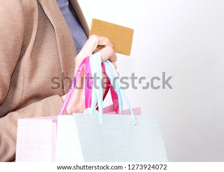 woman enjoying shopping with a credit card stock photo