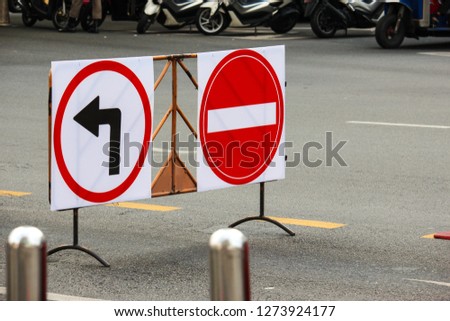 Traffic signs do not pass, through the right turn on the steel barrier panel